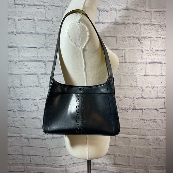 Mondani Handbags - MONDANI New York Black Vegan Leather Bag with Cut Pattern Front pocket Accent
